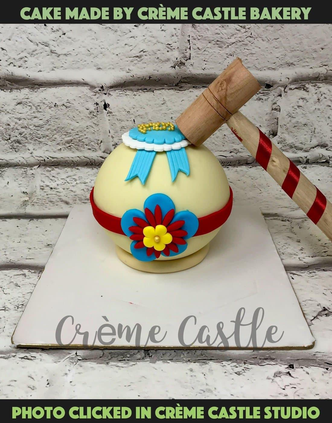 Rakhi Round Pinata Design Cake - Creme Castle