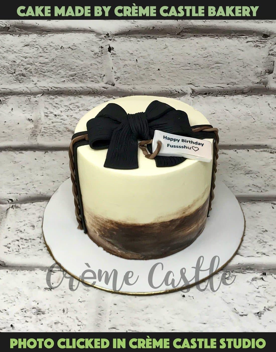 Hand painted with Bow Design Cake - Creme Castle
