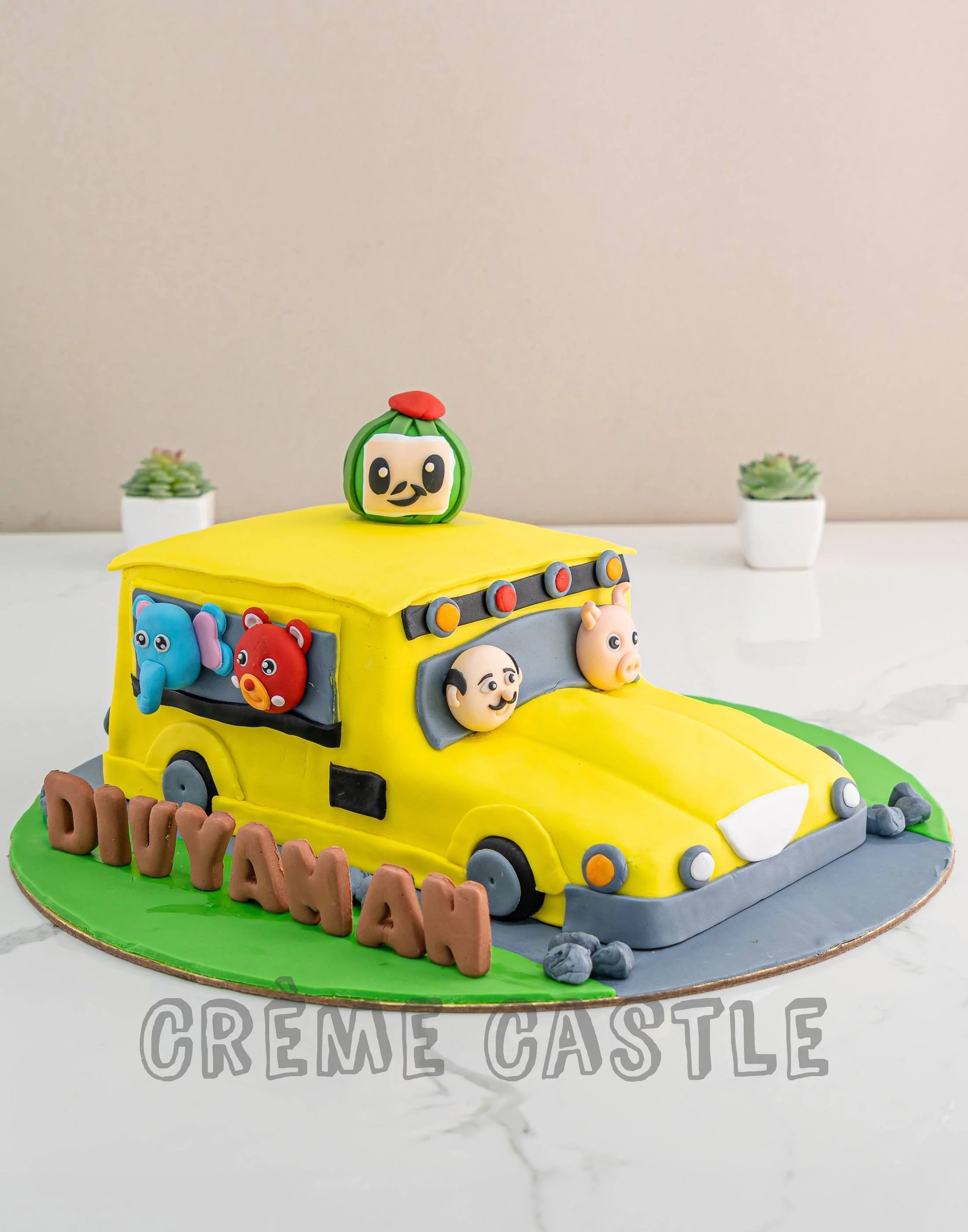 Cocomelon Bus Theme Cake. Cocomelon Family Cake. Noida & Gurgaon