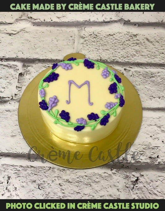 M Letter Design Cake - Creme Castle