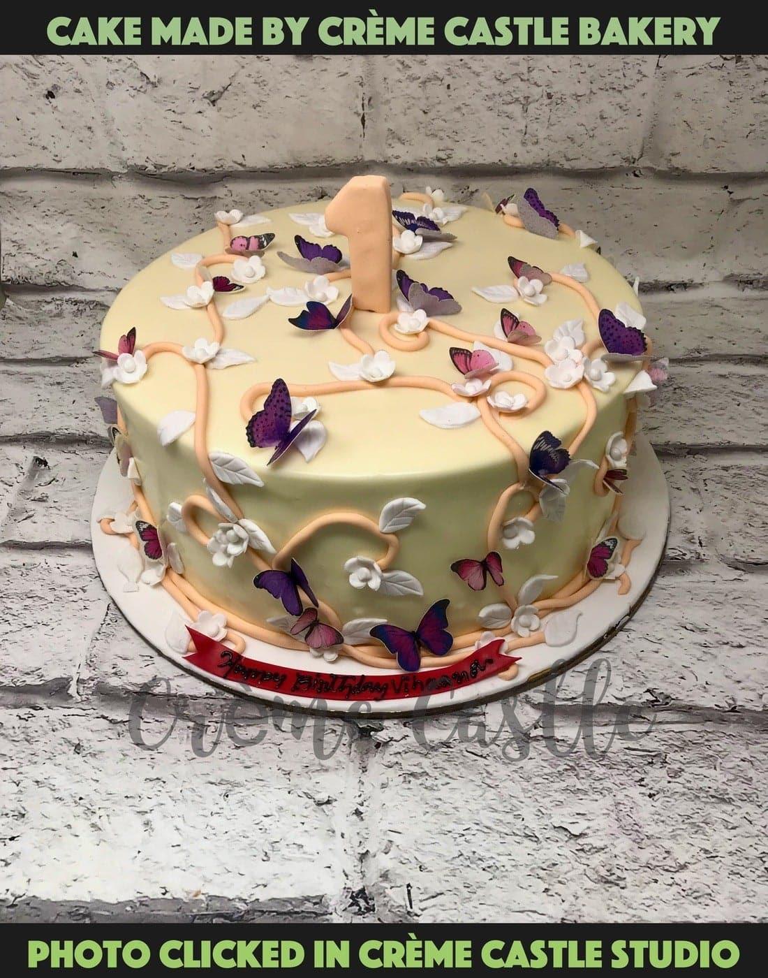Flowers and Butterfly Design Cake - Creme Castle