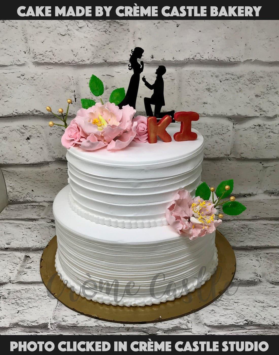 The floral Proposal Cake - Creme Castle