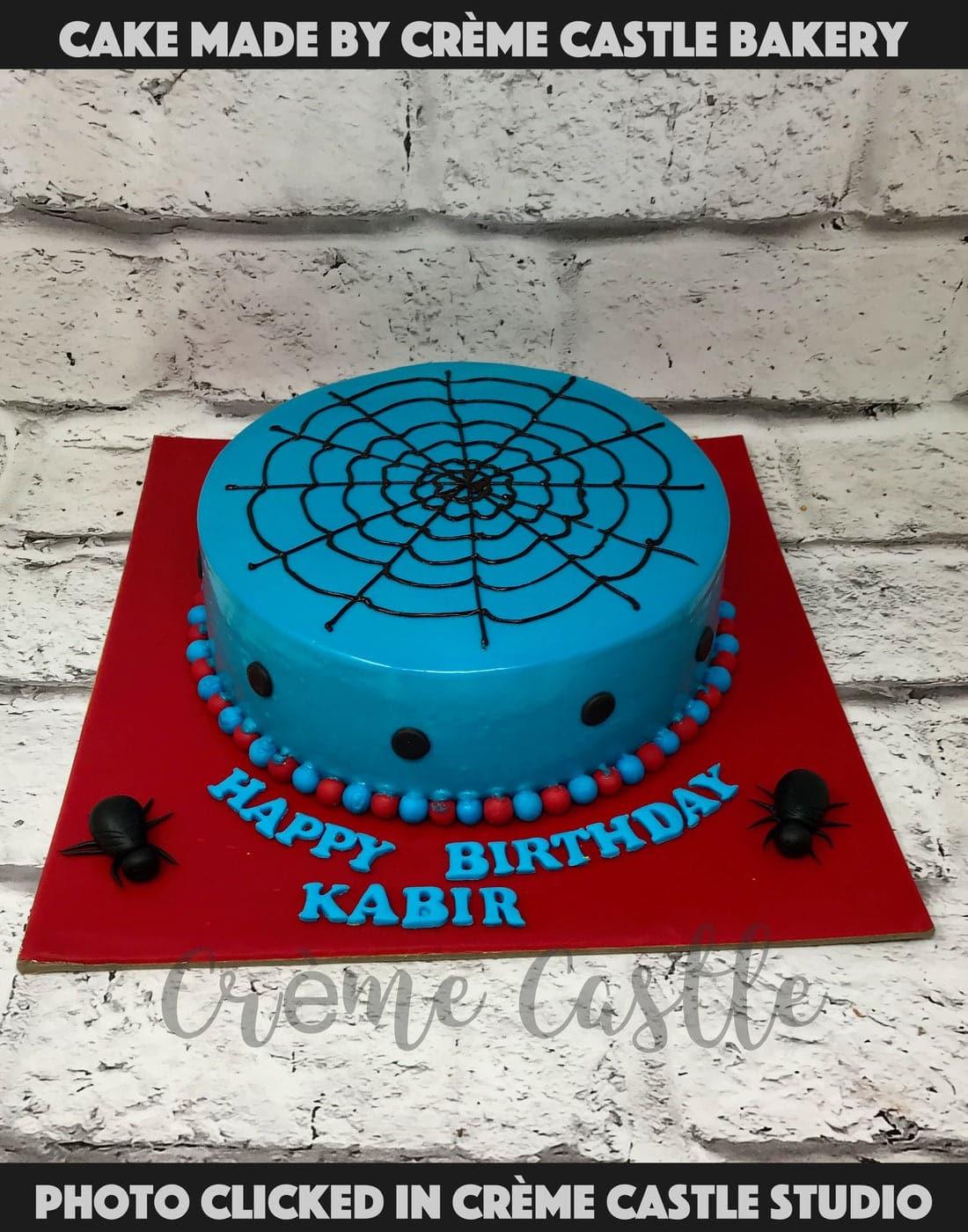 Blue Spiderweb Cake - Creme Castle