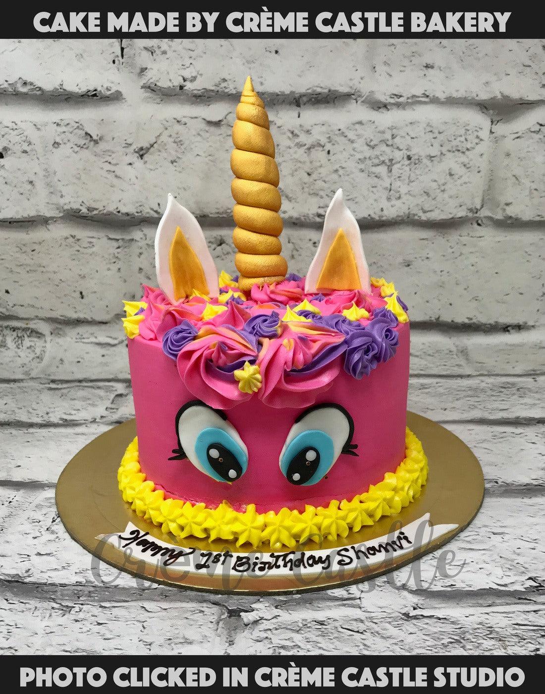 Pink and Yellow Unicorn Cake - Creme Castle