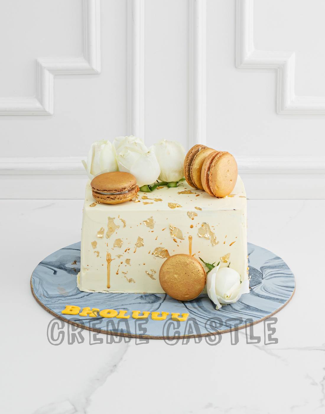 Golden Macaron Cake - Creme Castle
