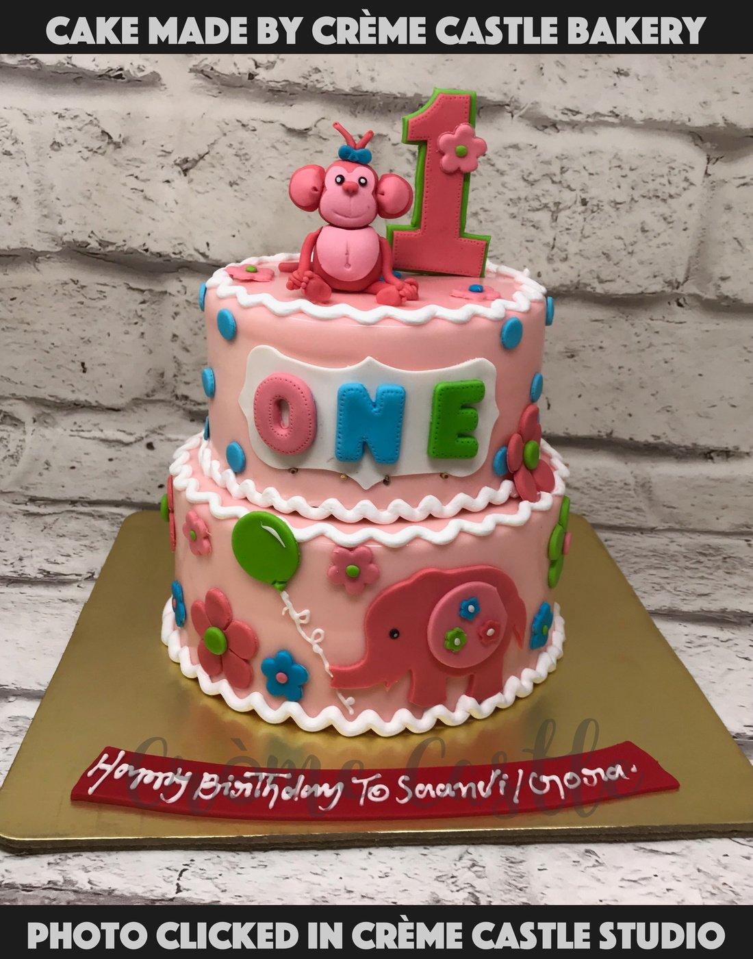 Pink Animal World Cake - Creme Castle