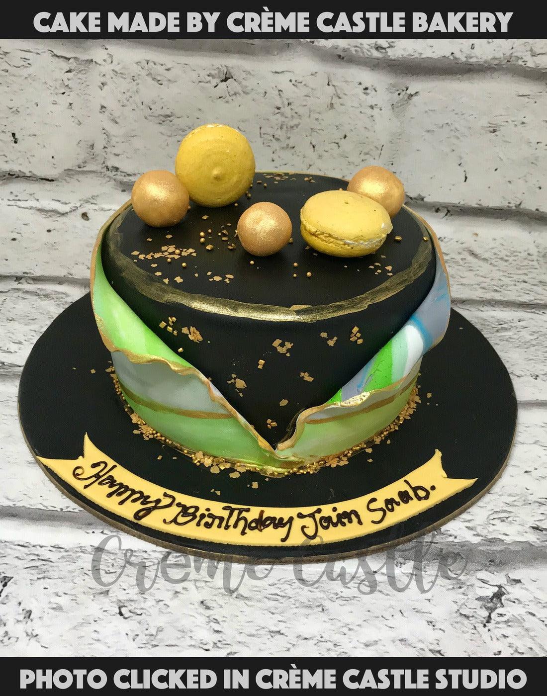 Golden Ball and Macaron Cake - Creme Castle