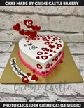 Red Hearts on White Cake