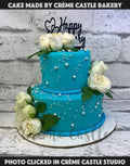 White Roses on Blue Cake