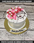Pink and White Floral Face Cake