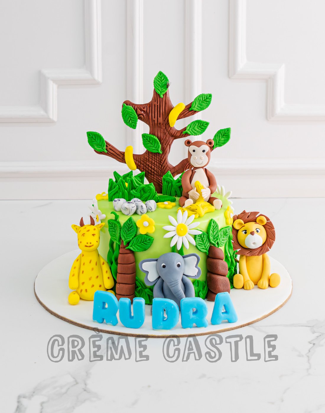 Jungle theme cake with Tree by Creme Castle