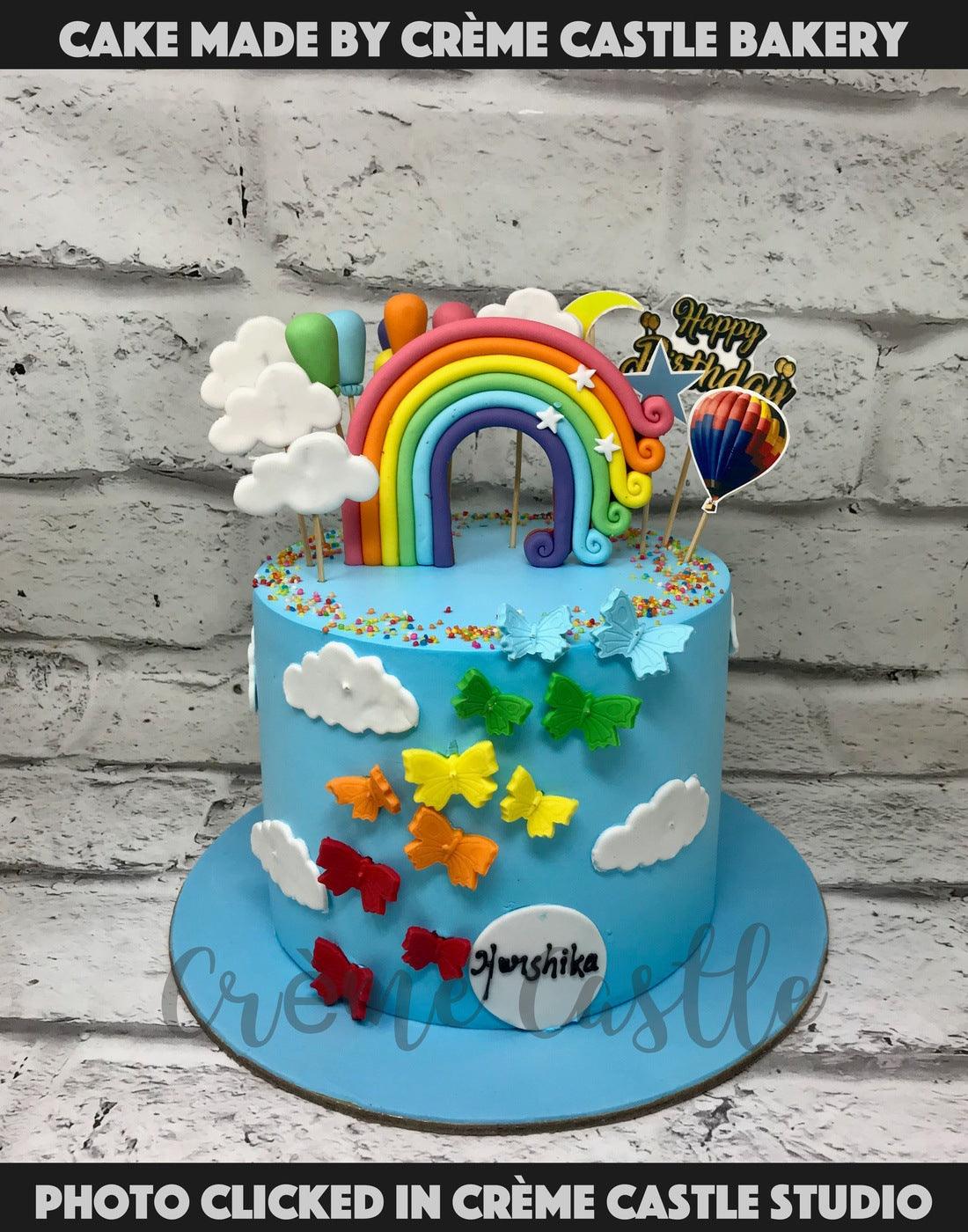 Butterflies and Rainbow Blue Cake - Creme Castle