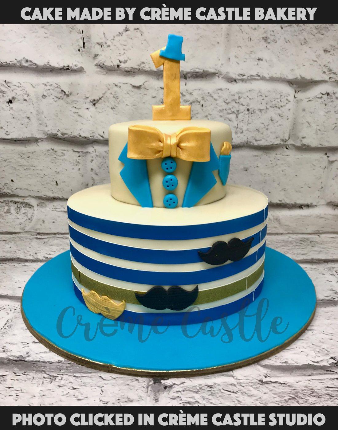 Blue Stripes and Bowtie Cake - Creme Castle