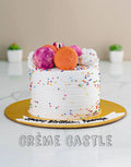 Sprinkles and Macarons Cake
