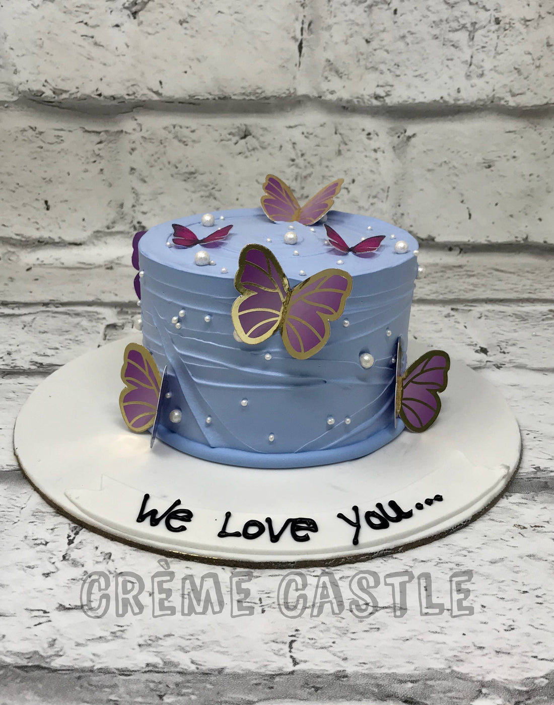 Butterfly Theme Cake in Blue by Creme Castle
