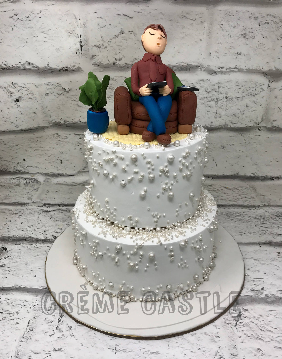 Retirement Theme Cake with Couch by Creme Castle
