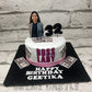 Boss Theme cake for a woman by Creme Castle