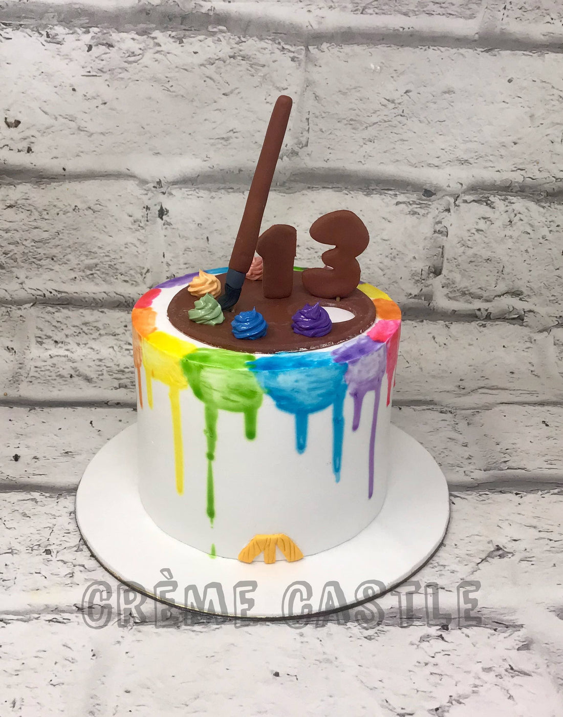 Painting Drip Cake by Creme Castle