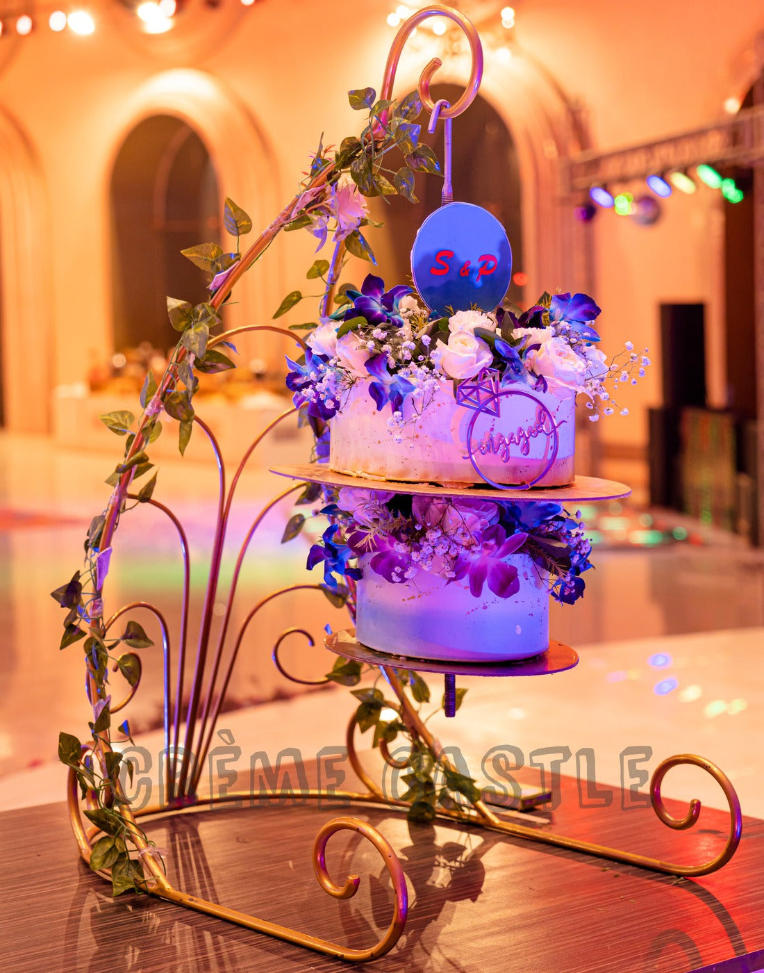 Photo of Suspended hanging wedding cake with stand