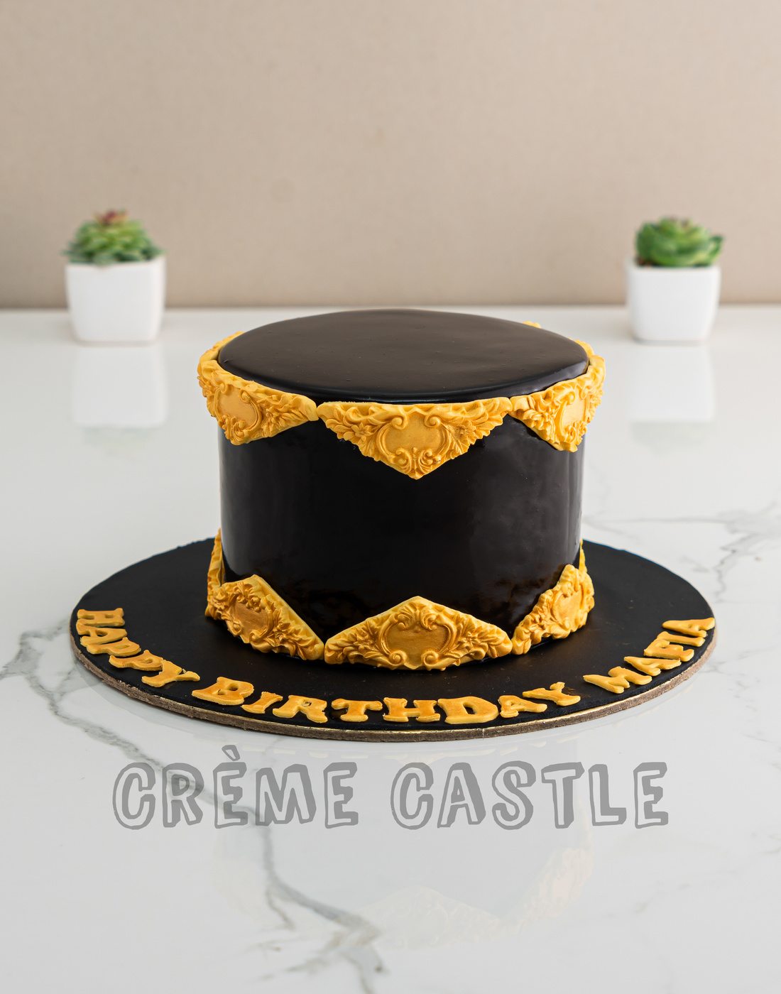 Gold Border Black Cake