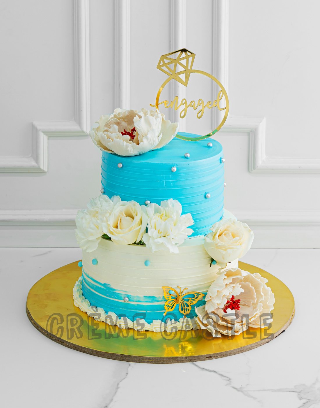 Was asked to make a teal/gold cake. Lemon cake and cream cheese filling :  r/cakedecorating