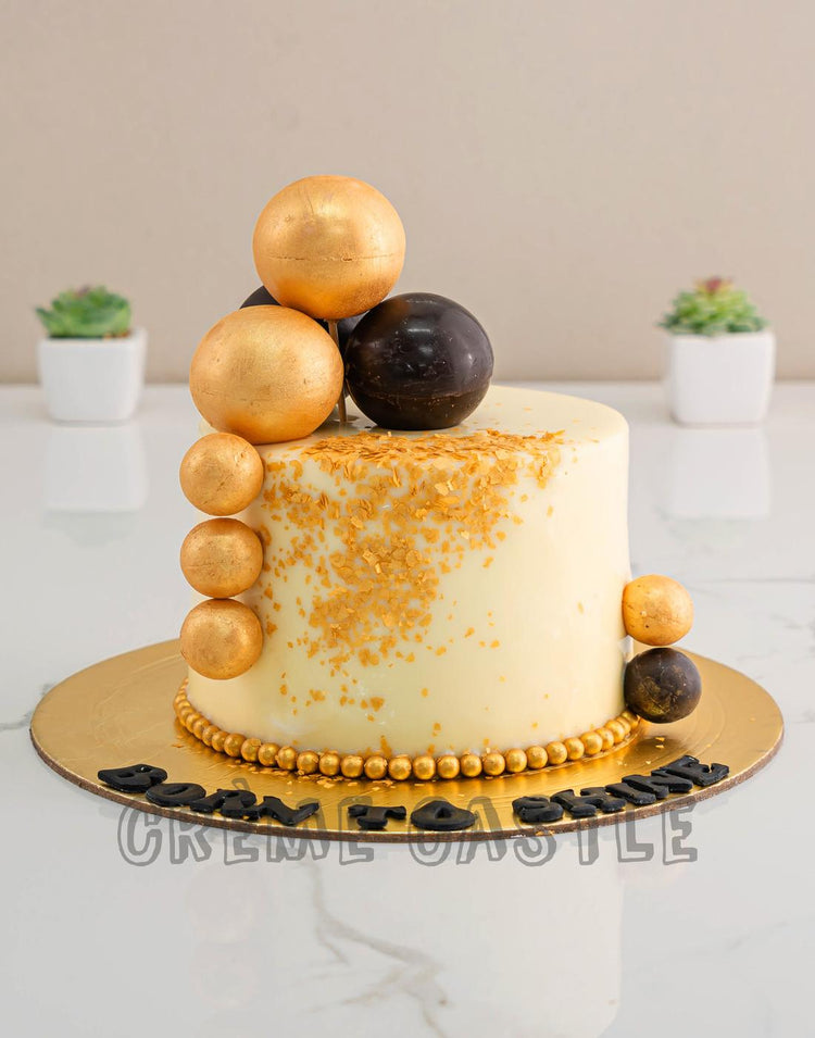 Gold Balls Splash Cake – Creme Castle