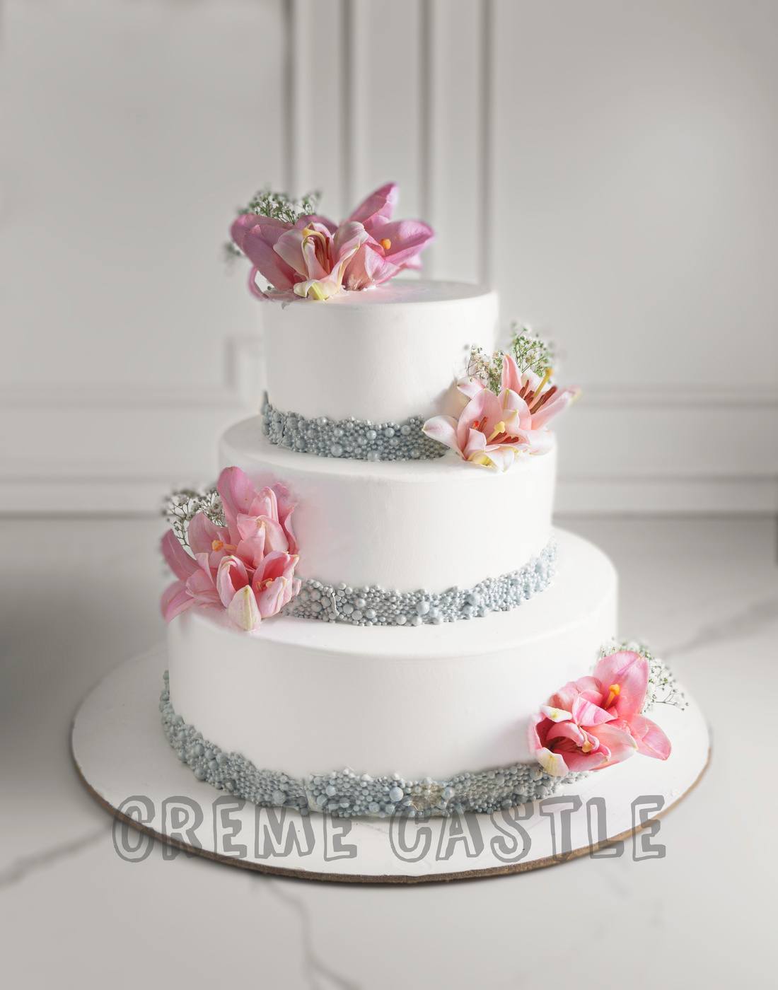 Pink Lily Wedding Cake - Creme Castle