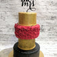 Red and golden wedding cake - Creme Castle