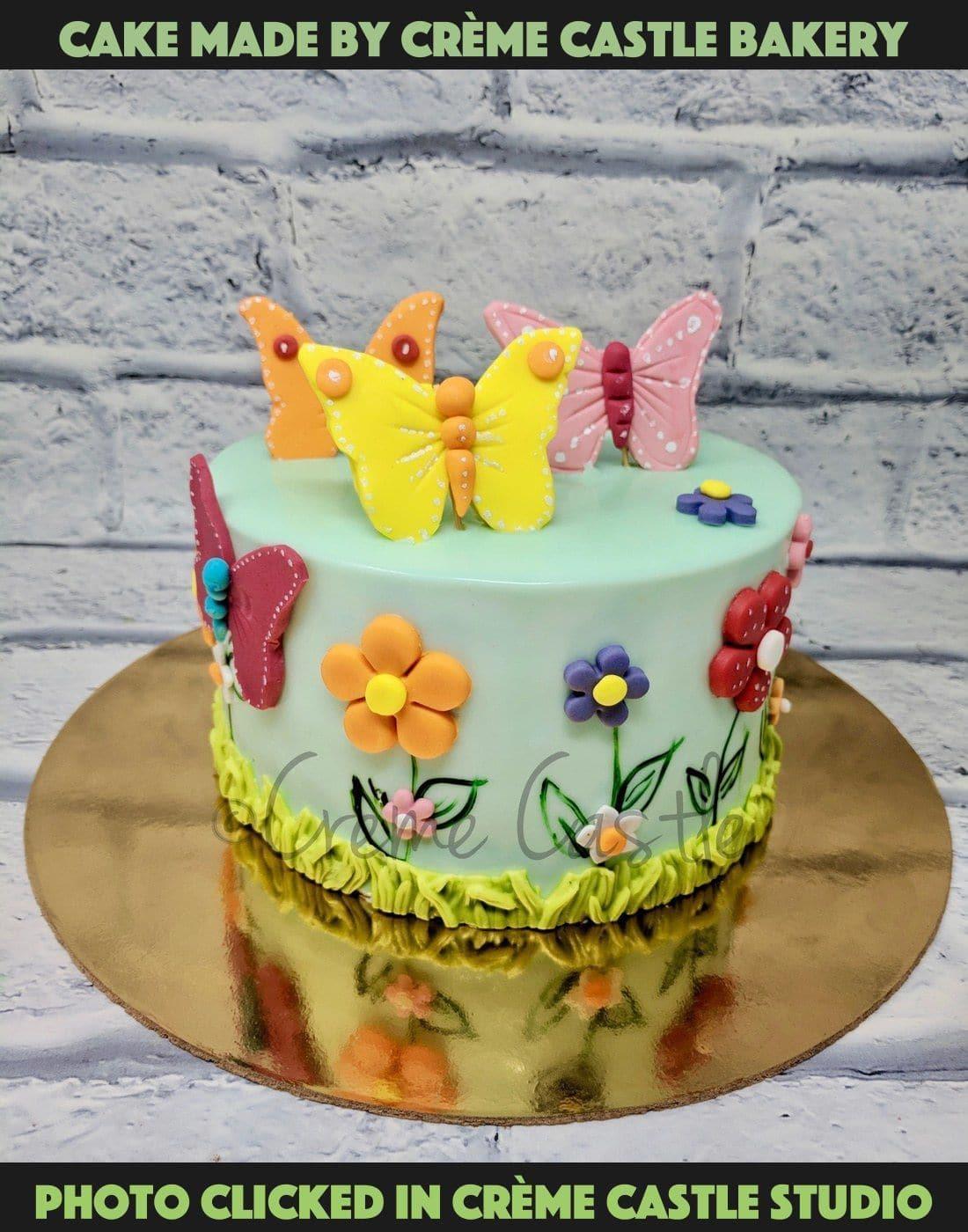 Butterfly theme cake by Creme Castle