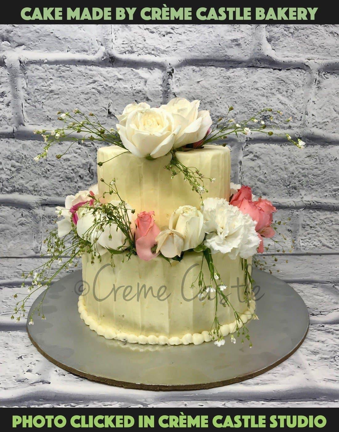 Tony's Confectionery - Fresh Cream cake in pink and white combination with  pink flowers made with fresh cream on top.. #frosting#pink#whitedots#flowers#egglesscake#sweets#beautiful#order#delivery#cakeshop..  | Facebook